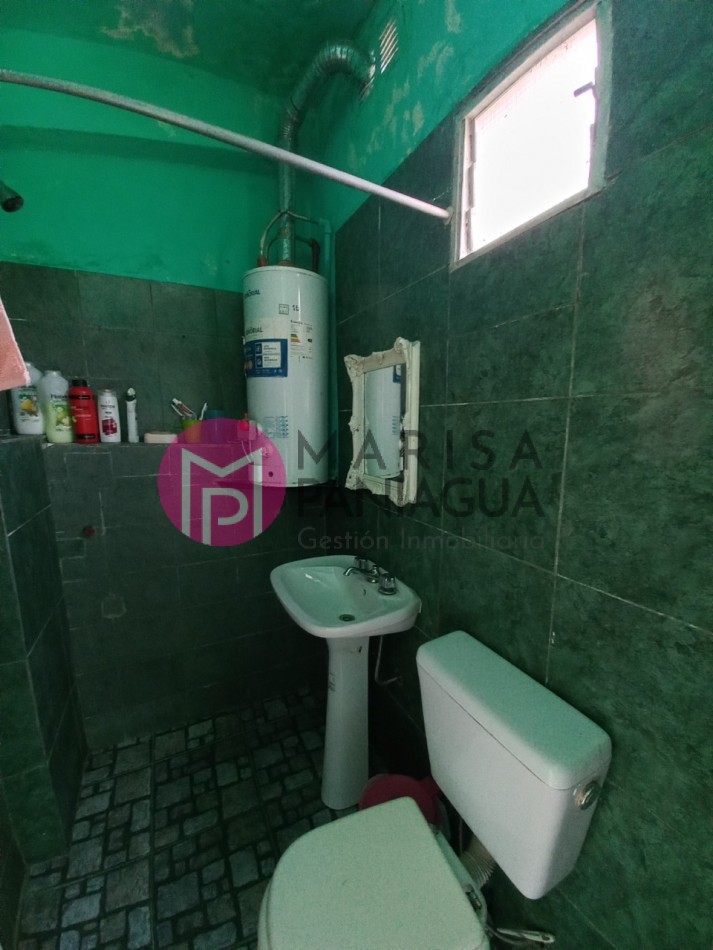 CASA CON DEPARTAMENTOS Y LOCAL